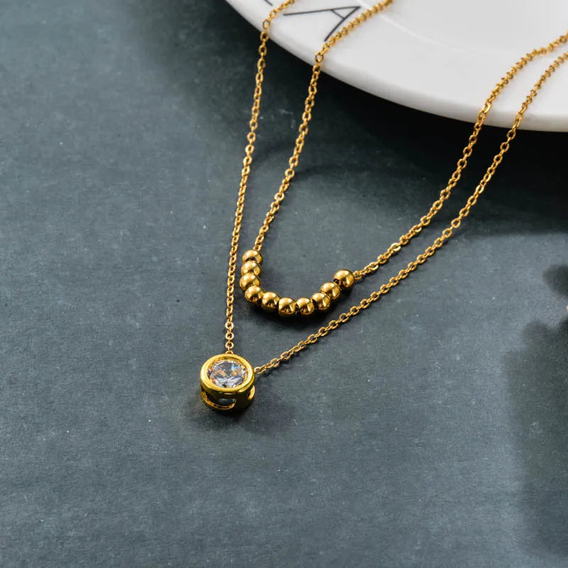 Collar Doble Dorado con Dije Brillante