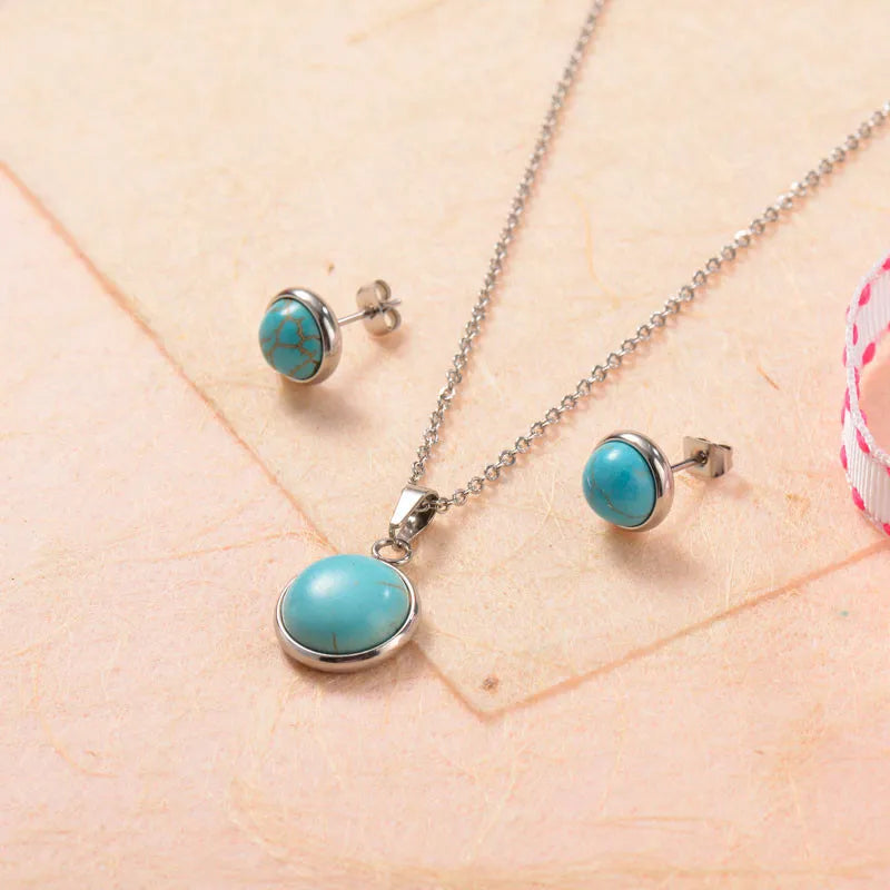 Conjunto plateado con turquesa