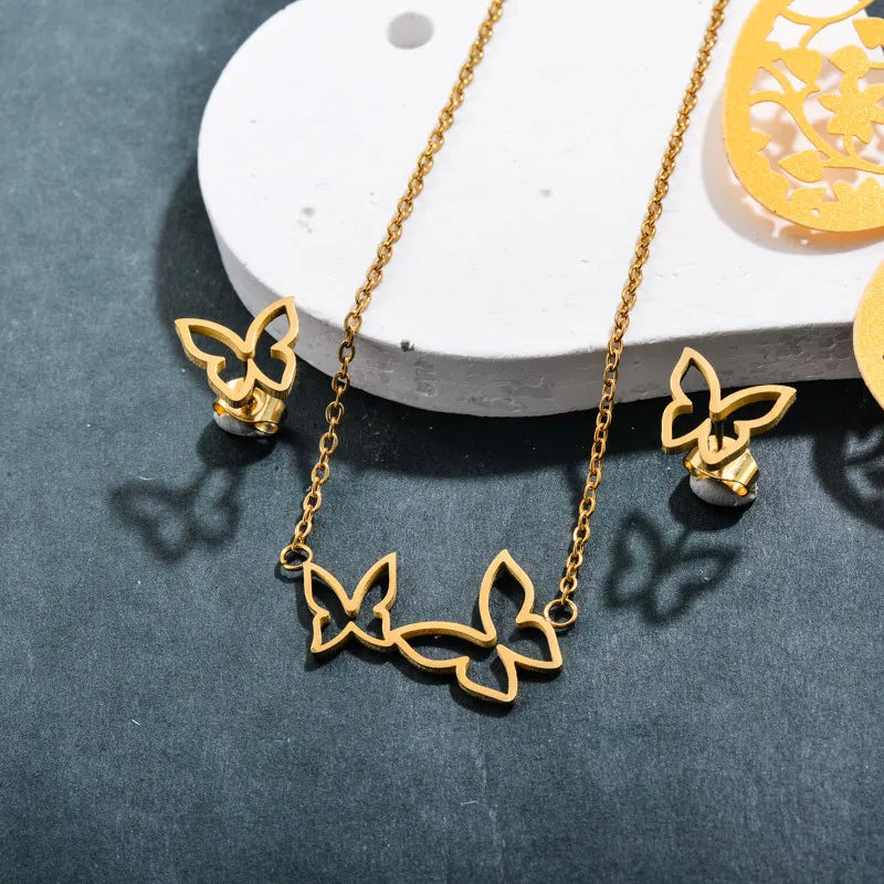Conjunto dorado mariposas