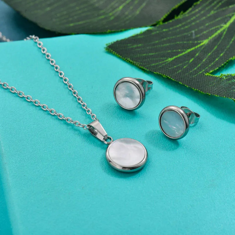 Conjunto plateado nácar circular