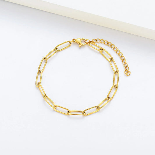 Pulsera dorada de eslabones rectangulares